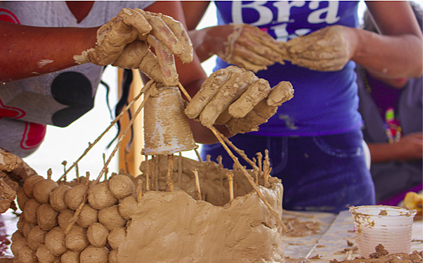 Hands doing clay work