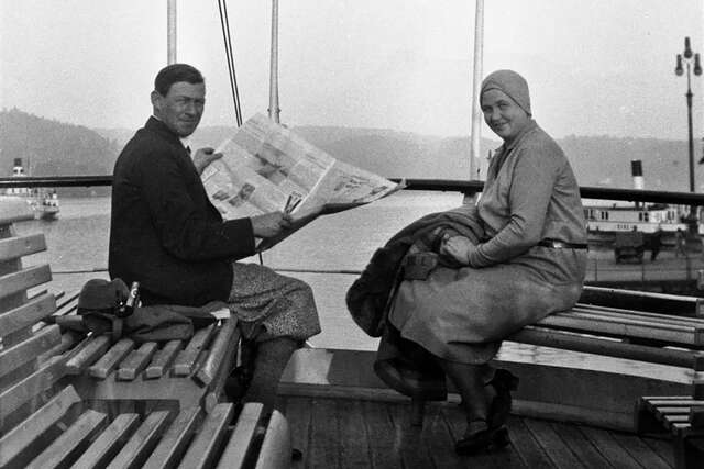 Black-and-white photo of a couple on a ship's deck