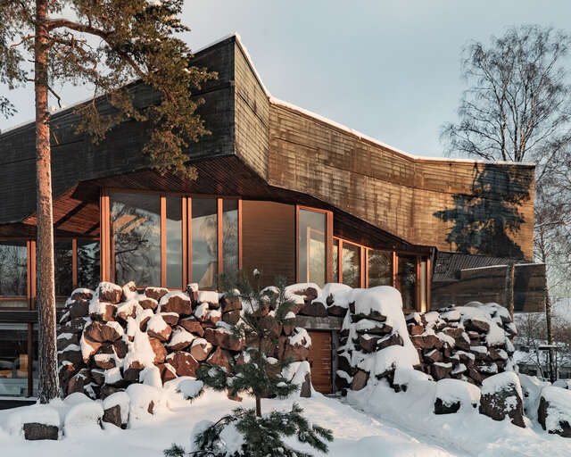 Otaniemi's Dipoli building surrounded by snow
