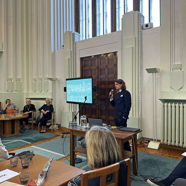 Young man giving a presentation.