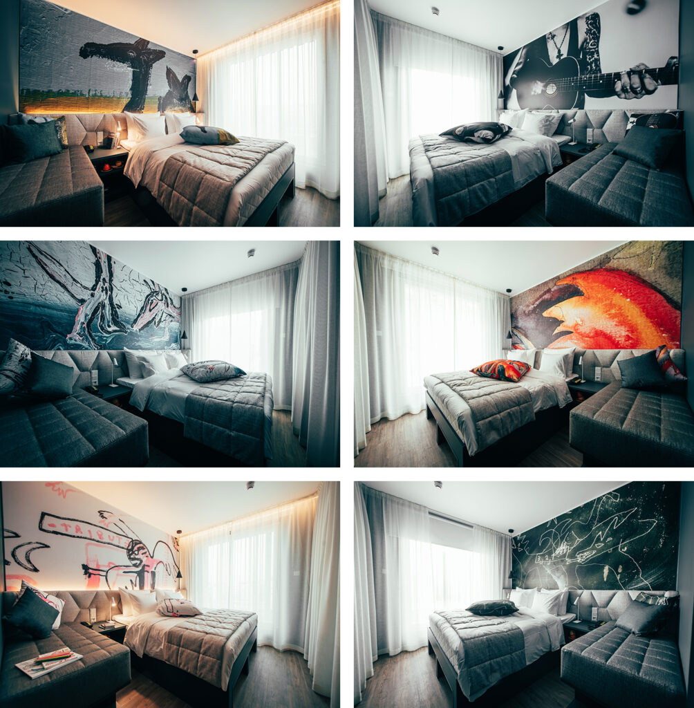 Kuusi kuvaa hotellihuoneista, joissa kaikissa sängyn taustaseinällä suuri taideteos.